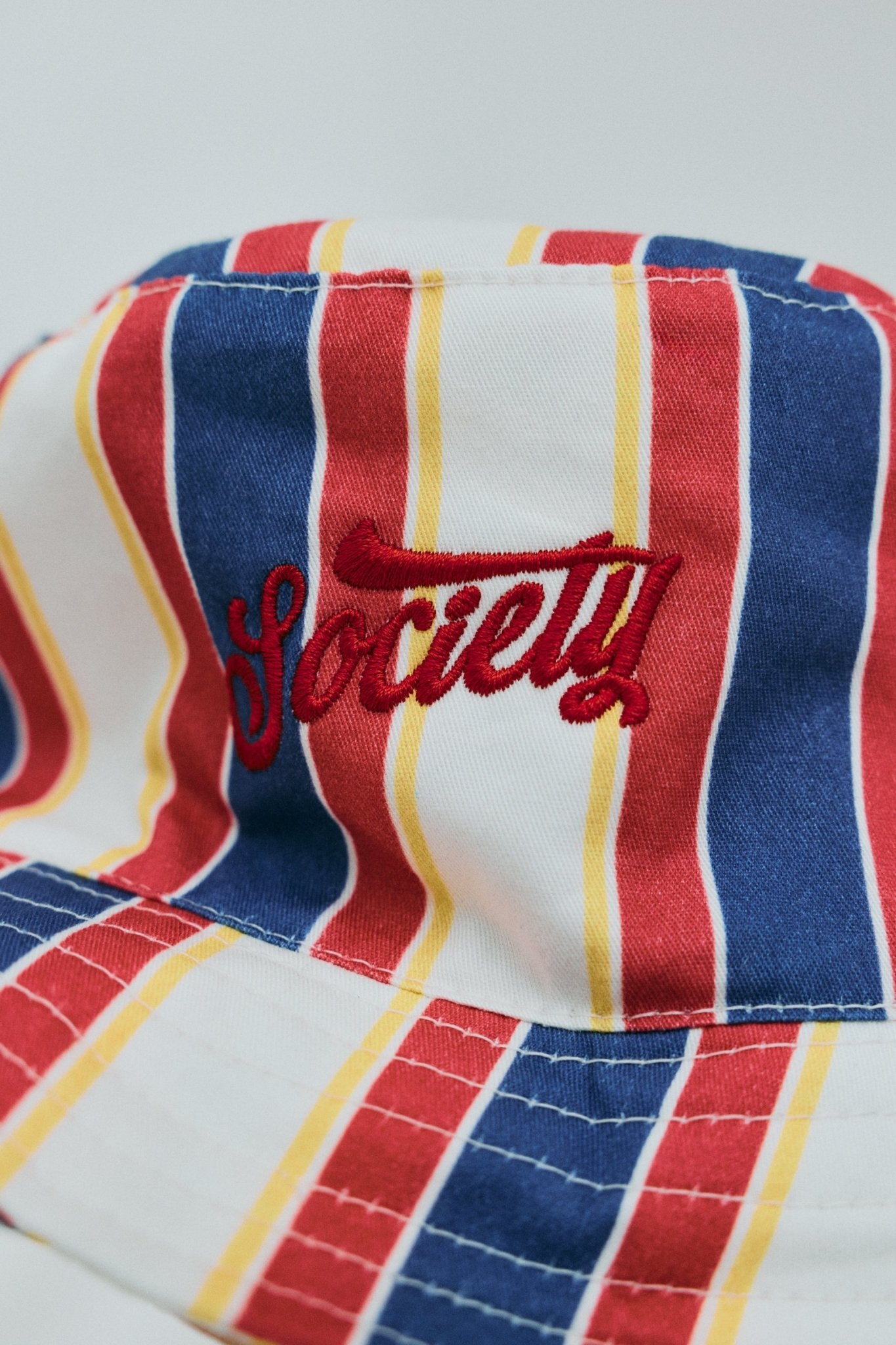 The New Society Gorse Stripes bucket hat righe