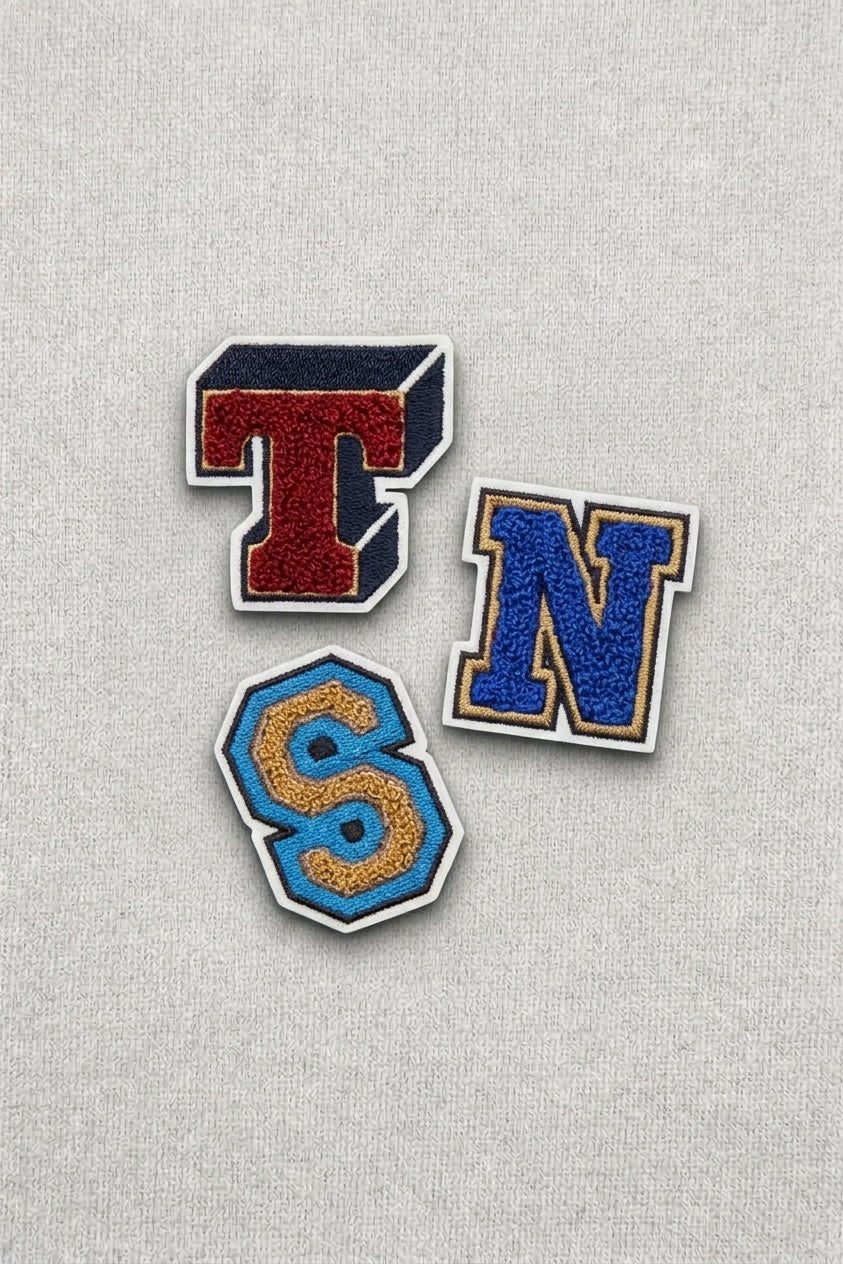 The New Society TNS toppe lettere varsity in cotone